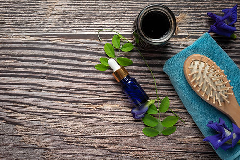 serum-bottle-butterfly-pea-flower-oil-put-wooden-background.jpg