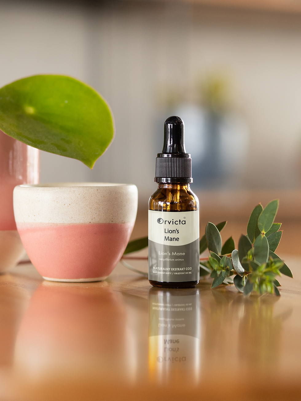 Eye-level view of natural supplements on wooden shelf