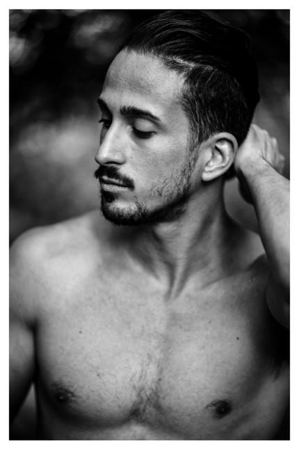 beautiful Portrait photography of a young Italian man with no shirt