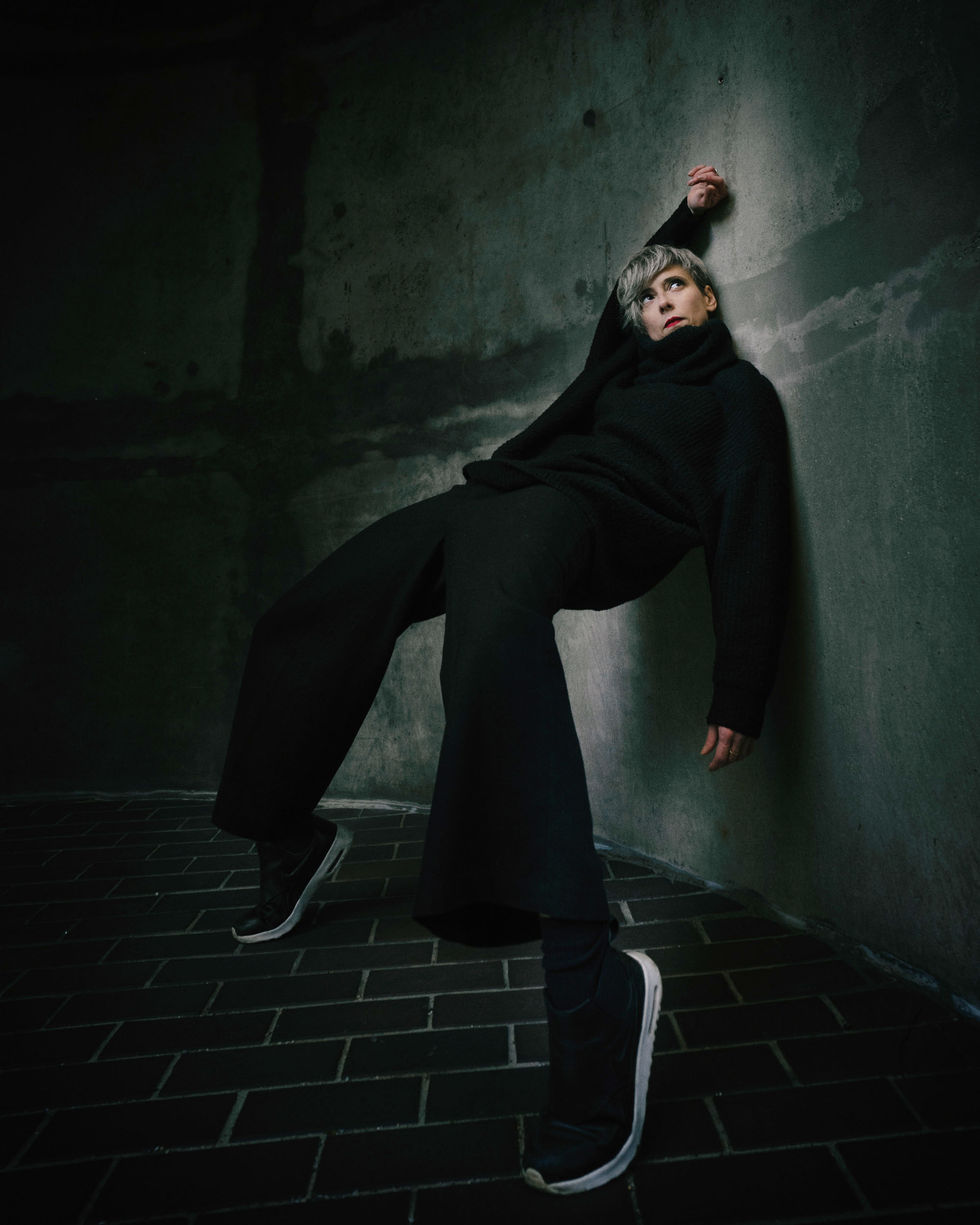 beautiful Portrait photography of a dancer wearing black clothes