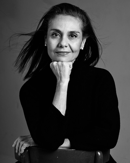 Portrait photography of a middle age woman with a black top