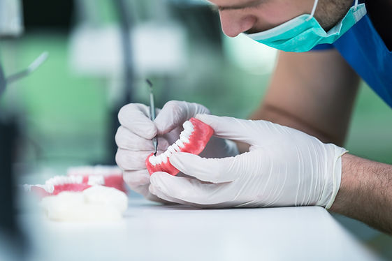 Laboratory technician working at a dental in-house-lab