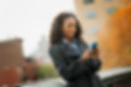 city-life-a-woman-in-a-coat-checking-and-texting-2022-03-04-02-30-37-utc.jpg