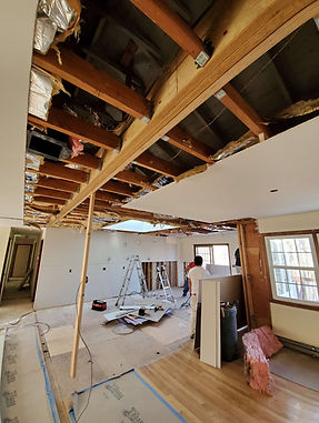 “Reinforcing load-bearing beam during residential structural repair project in Connecticut”