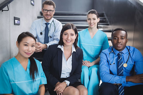 doctors-nurses-sitting-staircase.jpg