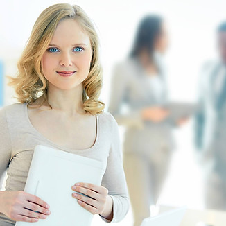 confident-businesswoman-holding-digital-tablet.jpg