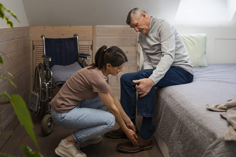 elderly-person-being-taken-care-by-female-caretaker.jpg