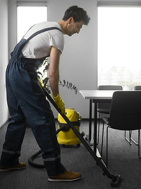 full-shot-man-cleaning-indoors.jpg