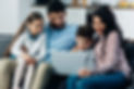 happy-hispanic-family-looking-at-laptop-at-home-2021-08-31-14-50-01-utc.jpg