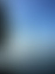 A person standing on the third-last step of a ladder, held by no one and standing at the edge of water, reaches for a shooting star in the distance. In the context of this post, it represents our expectations and how they impact our experience. Image by Armand Khoury.