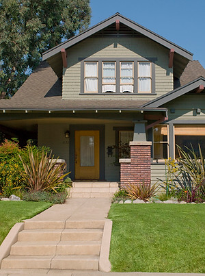 Beautiful grey home with green grass