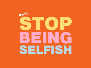 Brightly coloured, bold text that reads "Don't stop being selfish" on a vivid orange background. The word 'stop' is especially small so that, at first glance, you might think it reads "Stop being selfish".