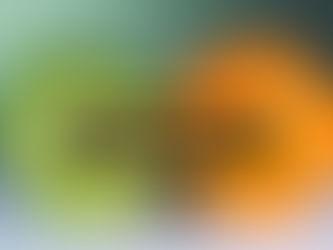 A picture of a green apple next to an orange. They are identical in size. Over the top is a panel of text that reads, "Comparisonitis: why comparing yourself to others is crippling your confidence"