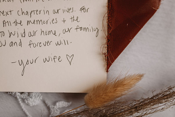 Handwritten letter that says "your wife"