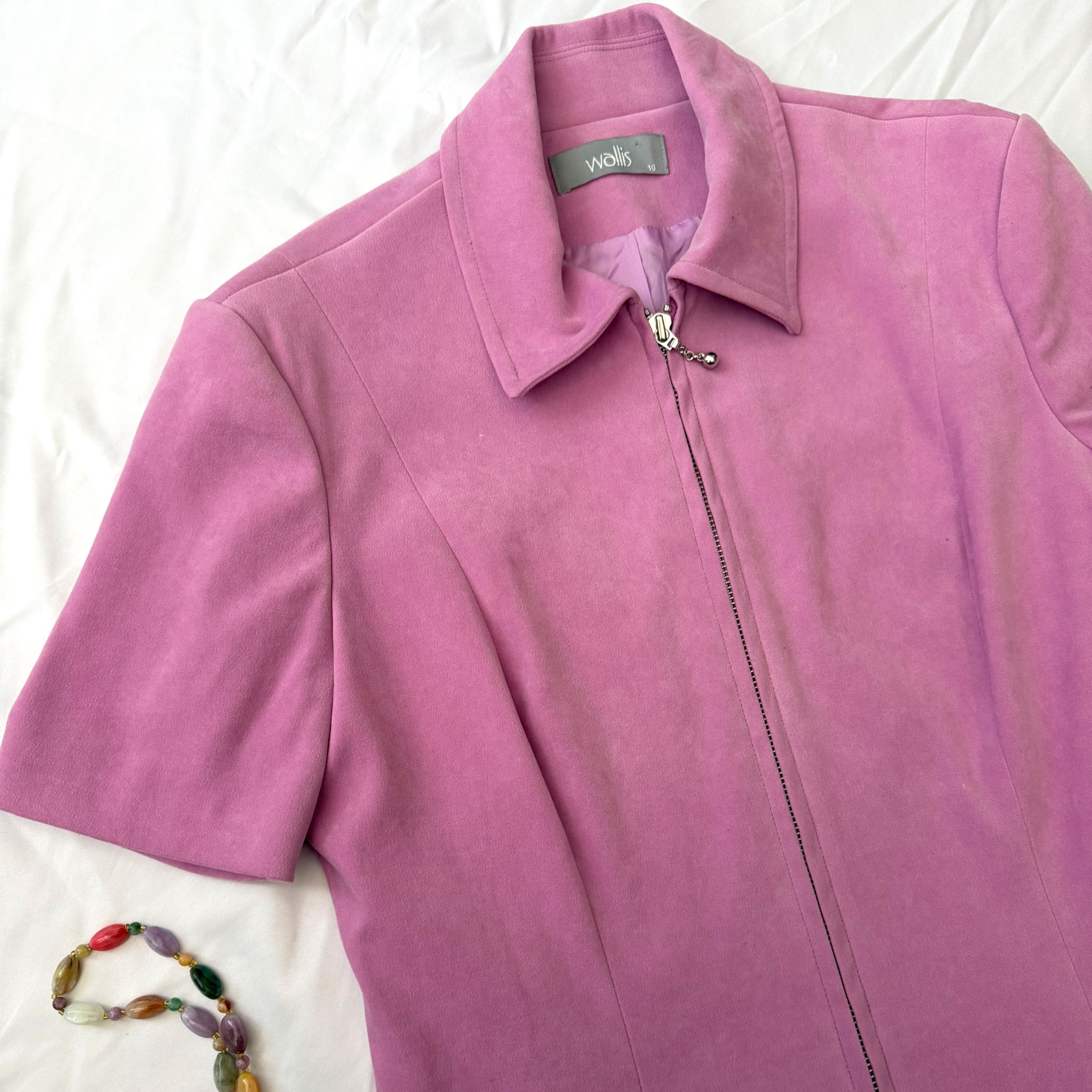 Pink fitted jacket/top