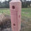Thumbnail: suet plug feeder hanging in a garden