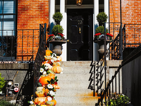 door step with pumpkins