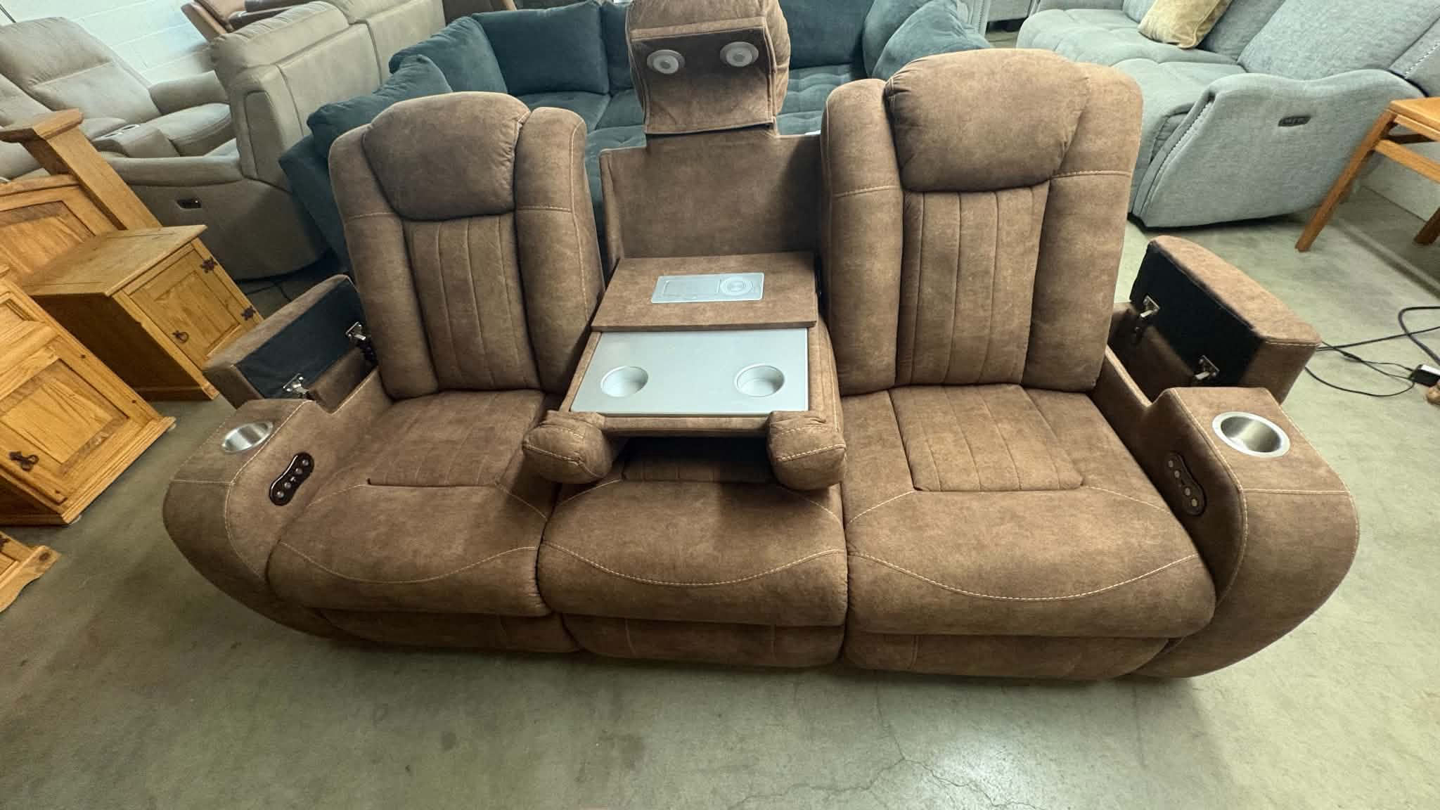 Brown electric reclining couch