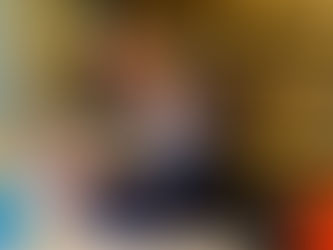 A Teaching Assistant working with a pupil at a local pottery studio