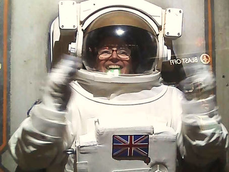 Maple class Teaching Assistant, Sarah, dress up as an astronaut