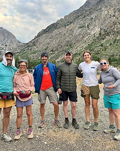 A GBF group with packs in front of Sierra Nevada peaks at YOSEMITE