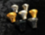 TL-BR: Titanium, Steel, Bronze, Brass, Brass, Buffalo Horn, Damasteel