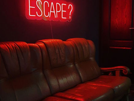 Escape room with neon sign