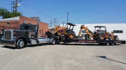 mora-transport-flat-bed-front-end-loader