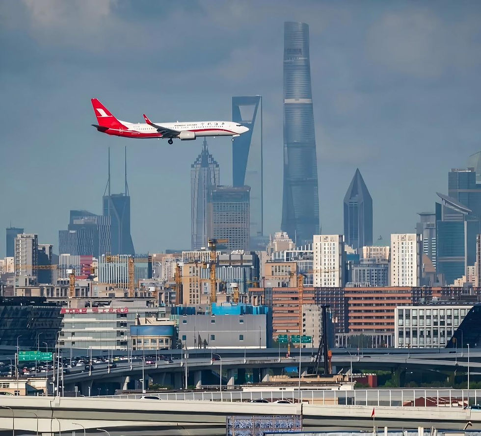 Airplane flying over Shanghai Pudong modern skyline during layover - Shanghai Layover Guide 2026