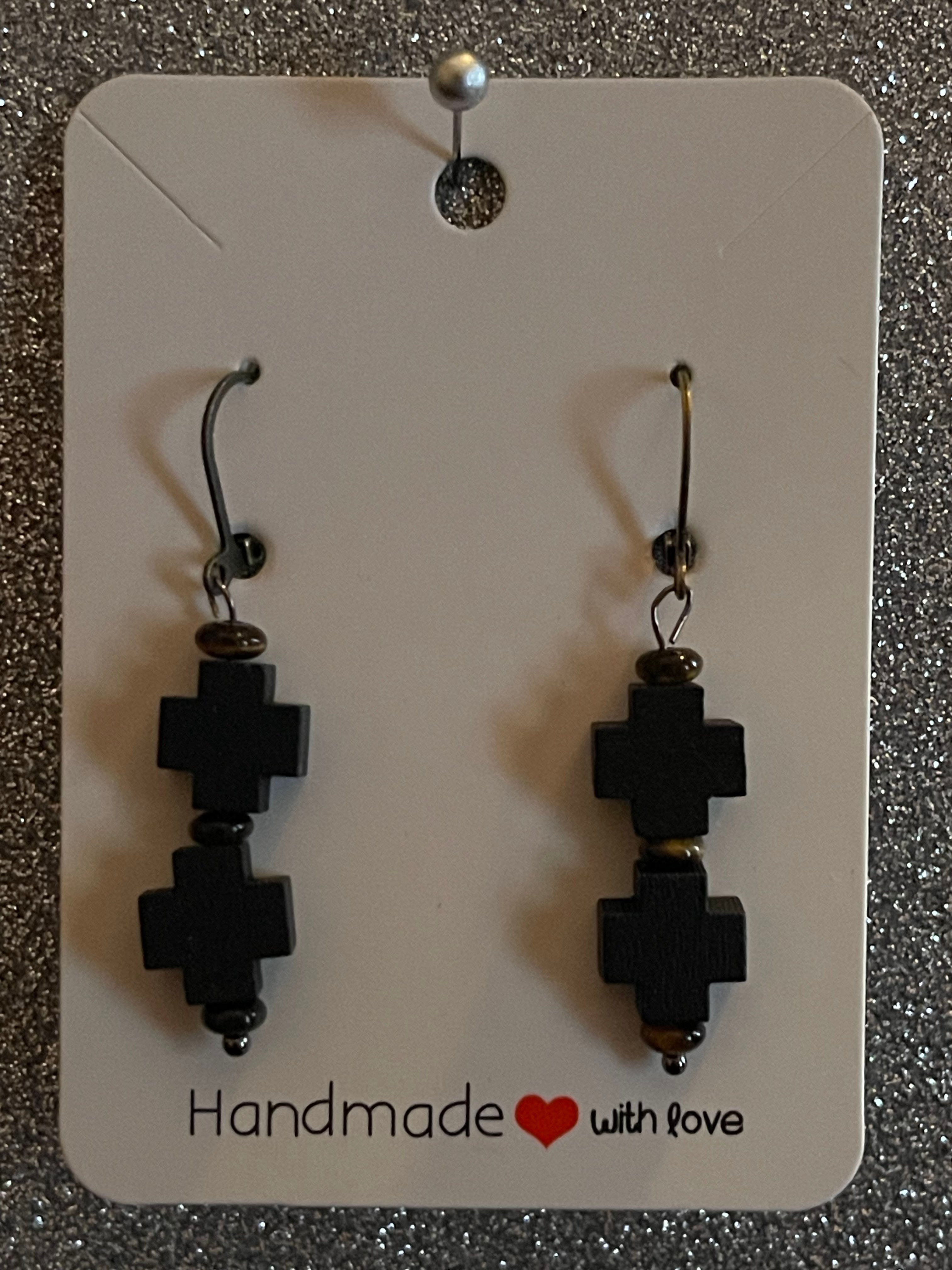 black wooden crosses