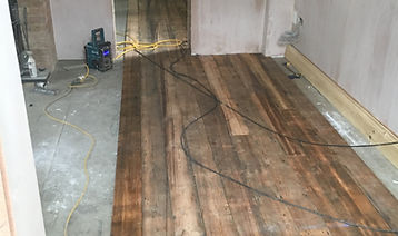 Reclaimedfloorlaying.JPG