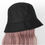 Thumbnail: Black hat with pink pastel wavy hair wig