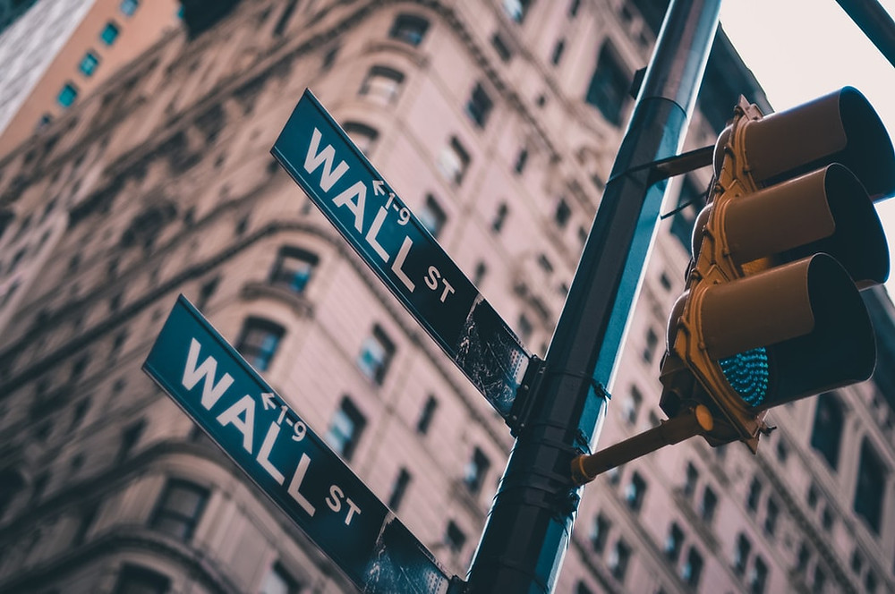 Wall Street Signs on the Street to Help Highlight the Invariant Investment Management Q2 2021 Market Report