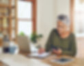 senior-woman-budget-planning-health-insurance-checklist-with-phone-home-writing-contract-e