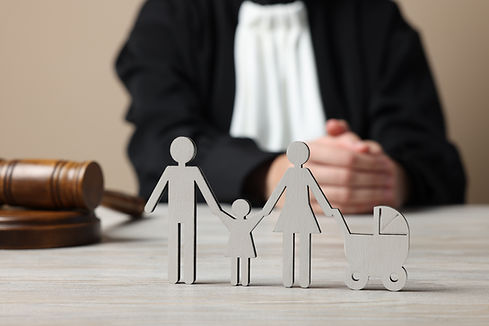 family-law-judge-with-gavel-sitting-white-wooden-table-focus-figure-parents-children.jpg