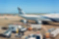airplane-wing-with-luggage-cargo-international-airport.jpg