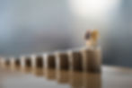 old-couple-figure-standing-top-coin-stack-with-gray-backgrounds.jpg