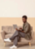 man-sitting-sofa-works.jpg