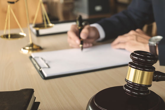 justice-law-concept-lawyer-working-paper-documents-courtroom.jpg