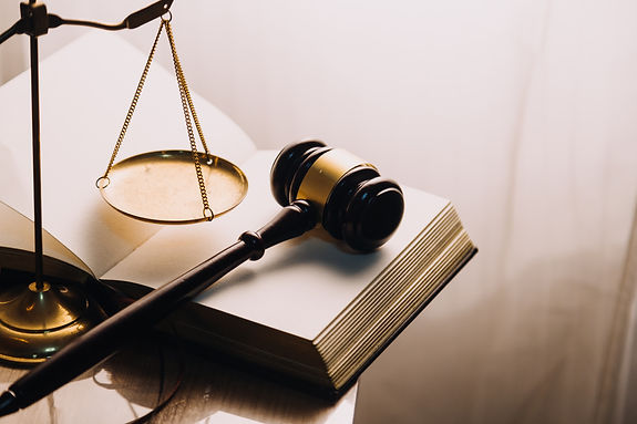 justice-law-conceptmale-judge-courtroom-with-gavel-working-with-computer-docking-keyboard-