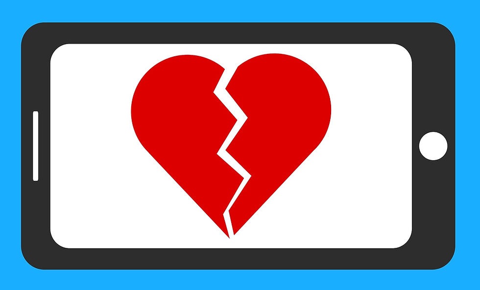 A broken heart on a phone screen