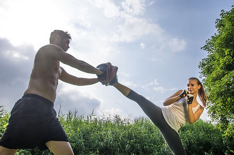 Woman Practicing Kick