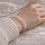 Thumbnail: moonstone bracelet on rumpled natural linen on a relaxed wrist