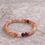 Thumbnail: fire quartz bracelet on natural linen