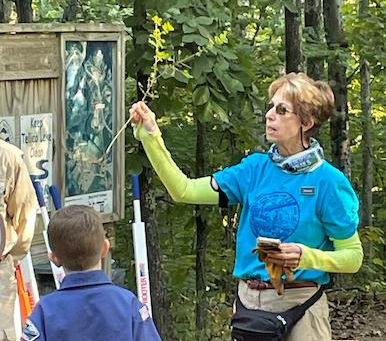 WATeR volunteers and Boy Scout troop members participating in privet removal along the Canal Branch of the East Lakeshore Trail for National Public Lands Day 2023