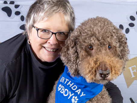 Sandra Ferguson with her dog, the inspiration behind her fine art dog photography.