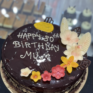 Dark chocolate, vanilla sponge, chocolate mirror glaze