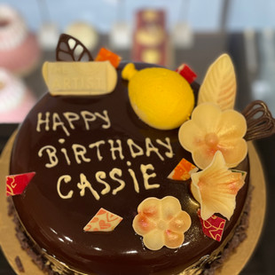Dark and white chocolate, vanilla sponge, chocolate mirror glaze