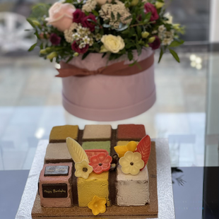 Cubix cube, milk chocolate, dark chocolate, peach insert, sponge