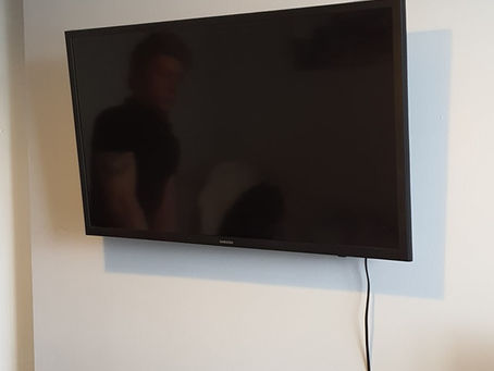 Hanged TV. Happy customer.